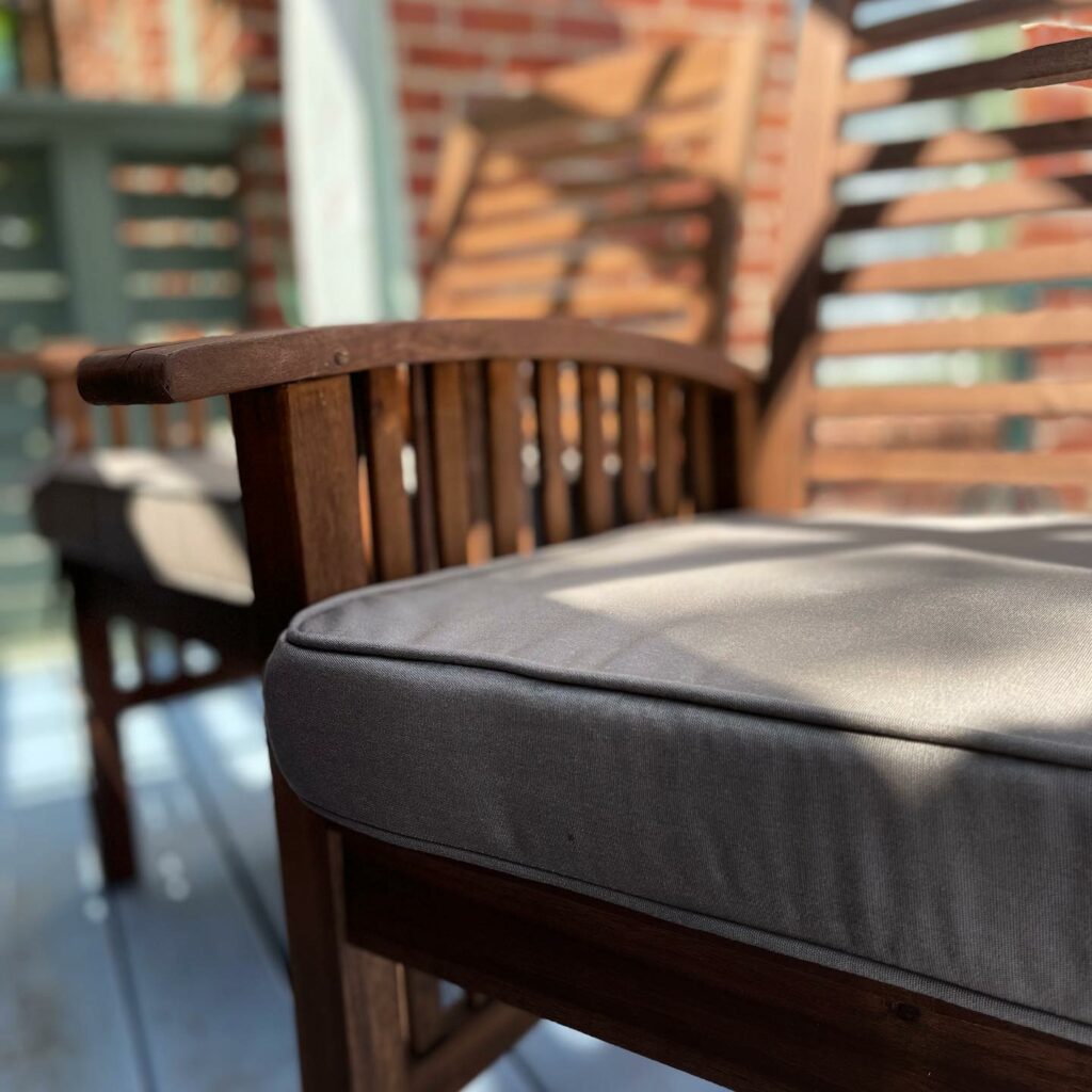 seating area in garden with quality outdoor cushions